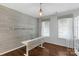 Office space with natural lighting, wood floors, and modern desk at 3013 Kensley Dr, Waxhaw, NC 28173