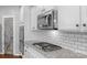 Well-equipped kitchen with a gas cooktop and modern appliances at 3013 Kensley Dr, Waxhaw, NC 28173