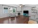 Bright living room with fireplace, modern furniture, and large windows at 3013 Kensley Dr, Waxhaw, NC 28173