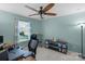 Comfortable office space with a large window providing natural light and a view of the yard at 3013 Kensley Dr, Waxhaw, NC 28173
