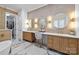 Elegant bathroom with custom vanities, marble floors, and modern lighting at 318 Montrose Dr, Waxhaw, NC 28173