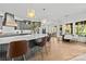 Spacious kitchen with island, pendant lighting, and an adjacent dining area at 318 Montrose Dr, Waxhaw, NC 28173