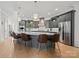 Elegant kitchen with large island, stainless steel appliances, and custom cabinetry at 318 Montrose Dr, Waxhaw, NC 28173