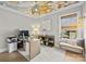 Home office featuring stylish ceiling, hardwood floors, and bench near a large window at 318 Montrose Dr, Waxhaw, NC 28173