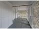 Covered back porch offering a peaceful outdoor space with lattice accents and neutral tones at 35 E Catawba St, Belmont, NC 28012