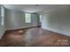 Bedroom featuring hardwood floors, natural light and window at 35 E Catawba St, Belmont, NC 28012