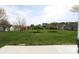 Lush backyard view from the patio featuring mature landscaping and well-maintained lawns at 403 Garner Dr, Salisbury, NC 28146