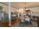 Dining room featuring a chandelier, hardwood floors and an area rug at 403 Garner Dr, Salisbury, NC 28146