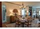 Dining room with hardwood floors and a view of the fireplace in the living room at 403 Garner Dr, Salisbury, NC 28146