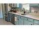 Updated kitchen featuring quartz countertops, stainless steel appliances, and gray backsplash at 403 Garner Dr, Salisbury, NC 28146