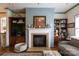 Living room with a fireplace flanked by built-in cabinets at 403 Garner Dr, Salisbury, NC 28146
