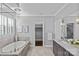 Relaxing bathroom with soaking tub, glass shower and updated vanity at 4038 City Homes Pl, Charlotte, NC 28209