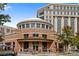 Commercial building with a mix of brick and modern architecture, offering local dining at 4038 City Homes Pl, Charlotte, NC 28209