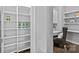 Bright home office space with custom shelving, modern desk and comfortable chair at 4038 City Homes Pl, Charlotte, NC 28209