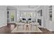 Inviting living room showcasing a fireplace, natural light, and seamless access to the outdoors at 4038 City Homes Pl, Charlotte, NC 28209