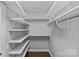 Spacious walk-in closet with custom shelving providing ample storage at 4038 City Homes Pl, Charlotte, NC 28209