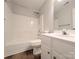 Clean bathroom featuring white cabinets, a shower-tub combo, and neutral wall color at 4608 Mabry Pkwy, Rock Hill, SC 29732