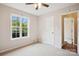 Cozy bedroom with neutral carpet, natural light, window and closet adjacent to the entry at 4608 Mabry Pkwy, Rock Hill, SC 29732