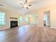 Spacious living room with vaulted ceilings, fireplace, hardwood floors, and open floor plan at 4608 Mabry Pkwy, Rock Hill, SC 29732