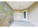 Enclosed patio featuring a ceiling fan with a backyard view including a shed and mature trees at 4608 Mabry Pkwy, Rock Hill, SC 29732