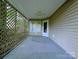 Screened porch features neutral wall color and a ceiling fan at 4608 Mabry Pkwy, Rock Hill, SC 29732