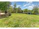 The home's backyard has a deck, shed, and lots of green space at 4767 Stratford Ln, Denver, NC 28037