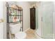 Bathroom features a shower and storage at 4767 Stratford Ln, Denver, NC 28037