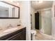 Clean bathroom featuring a shower and vanity at 4767 Stratford Ln, Denver, NC 28037