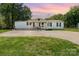 Charming home with white exterior, black shutters, and covered front porch at 4767 Stratford Ln, Denver, NC 28037