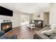 Inviting living room with a cozy fireplace, access to the deck, and comfortable seating at 4767 Stratford Ln, Denver, NC 28037