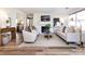 Cozy living room featuring a fireplace, comfortable seating, and modern decor at 5007 Sharon Rd # S, Charlotte, NC 28210