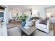 Spacious living room with contemporary decor and hardwood floors overlooking the dining area at 5007 Sharon Rd # S, Charlotte, NC 28210