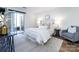 Serene bedroom with a sliding glass door to a private patio and a sitting area at 5007 Sharon Rd # S, Charlotte, NC 28210