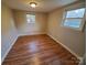 Bright bedroom features natural light, hardwood floors and ample space at 5628 Anderson Rd, Charlotte, NC 28269