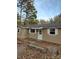 Exterior elevation shows the front door and windows of the property at 5628 Anderson Rd, Charlotte, NC 28269