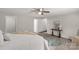 Spacious bedroom with neutral walls, a ceiling fan, and carpeted floors at 6057 Highway 97 Hwy, Hickory Grove, SC 29717