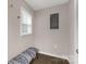 Cozy hallway nook with a patterned bench, window, and neutral wall color at 6057 Highway 97 Hwy, Hickory Grove, SC 29717