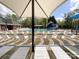 Community pool with lounge chairs and a slide for residents' enjoyment at 6114 Abergele Ln, Matthews, NC 28104