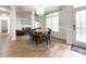 Inviting dining area with lots of natural light and a view into the living room, perfect for Gathering meals at 6114 Abergele Ln, Matthews, NC 28104