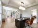 Bright office featuring large windows, natural light, custom millwork, and open access to the living spaces at 6114 Abergele Ln, Matthews, NC 28104