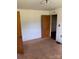 Bedroom with carpet, neutral walls, closet and view into the hallway of the home at 6309 New Town Rd, Waxhaw, NC 28173