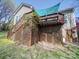 Large wooden deck with privacy lattice and a shady canopy at 7524 Common Oak Dr, Stanley, NC 28164