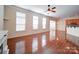 Cozy living room with open floor plan and hardwood floors for easy living at 7524 Common Oak Dr, Stanley, NC 28164