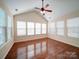 Bright sunroom with vaulted ceilings and many windows offers great natural light at 7524 Common Oak Dr, Stanley, NC 28164