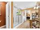 Spacious bathroom featuring a glass-enclosed shower, tub, and vanity with storage at 8619 Delamere Ln, Charlotte, NC 28269