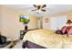 Bright bedroom features a TV, fan, a comfortable bed and plenty of storage space at 8619 Delamere Ln, Charlotte, NC 28269