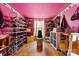 Large closet with shelving and hardwood floors at 8619 Delamere Ln, Charlotte, NC 28269