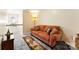Hallway with a comfortable couch and soft lighting at 8619 Delamere Ln, Charlotte, NC 28269