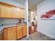 Bright kitchen features wooden cabinets and plenty of counter space at 920 Ashworth Dr, Gastonia, NC 28054