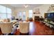 Inviting living room featuring hardwood floors, a cozy fireplace, and access to an outdoor patio at 920 Ashworth Dr, Gastonia, NC 28054